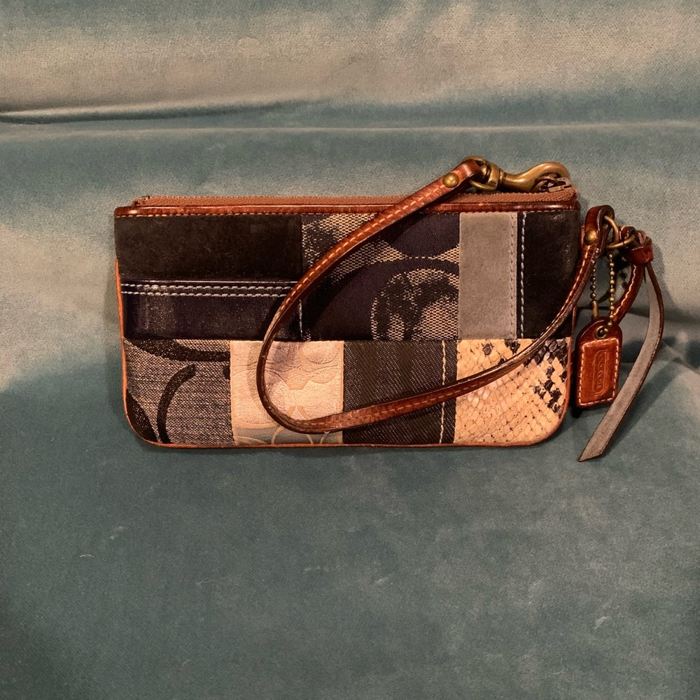 COACH denim patchwork wristlet.